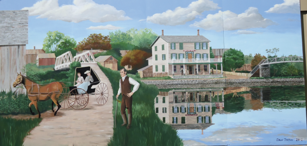 mural stands as a tribute to both the hospitality and hustle of canal life, and show the Exchange Hotel